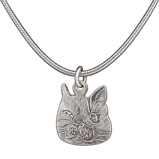 Handmade silver cat face pendant necklace with neutral silver colour and balanced product framing